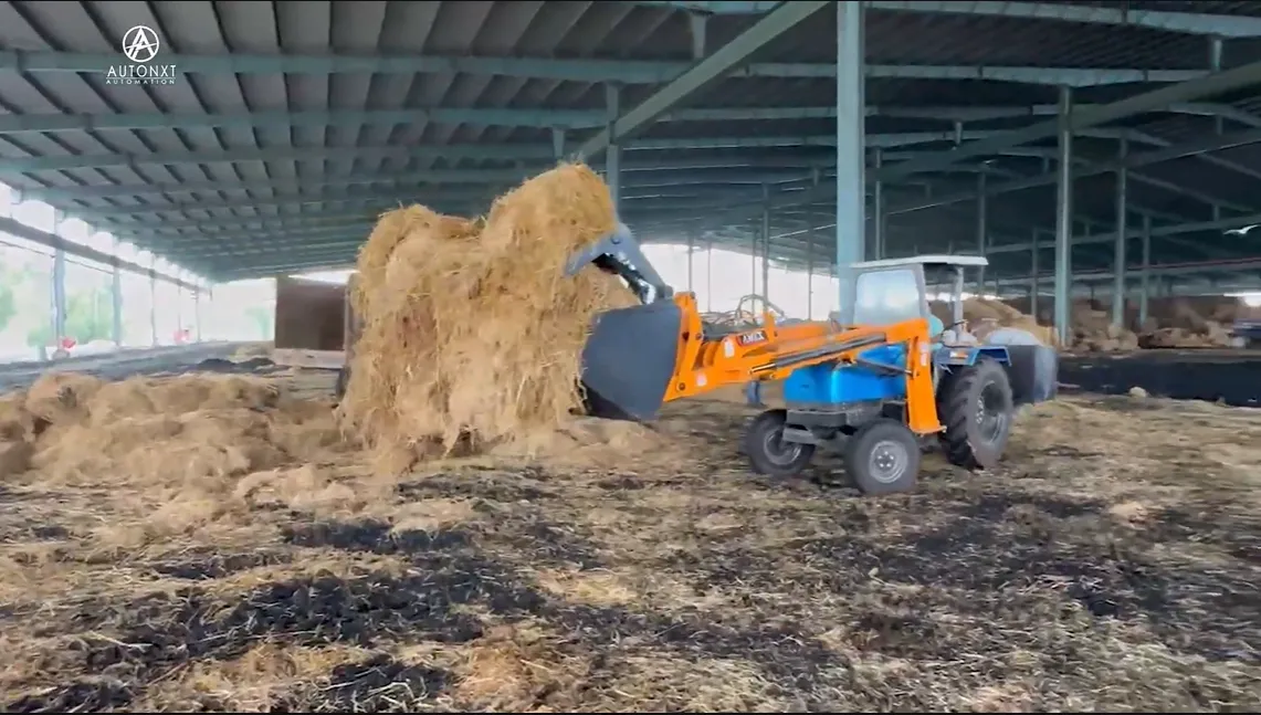 AutoNxt electric tractors loaded on a transport truck for delivery